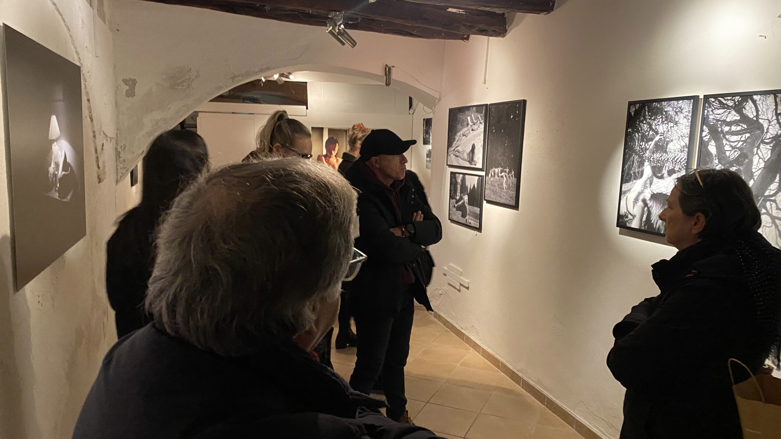 visitors looking at Entreterras artworks