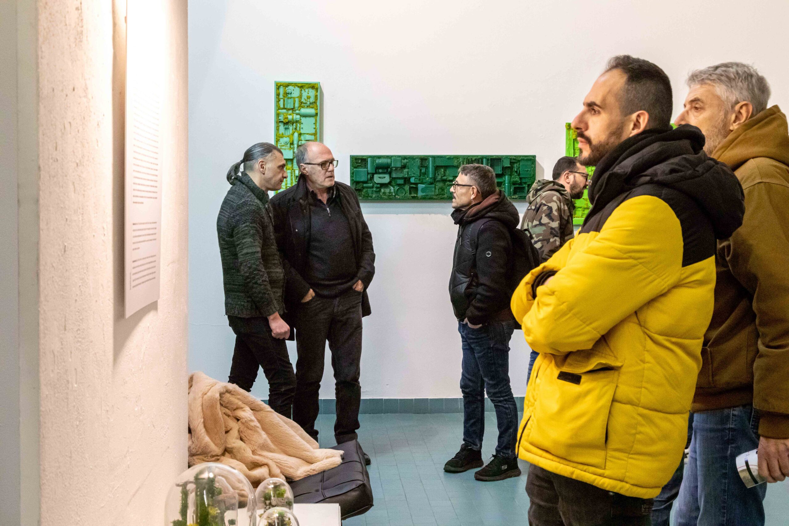 visitors reading Biocene exhibition concept - Photo: Massimiliano Frau